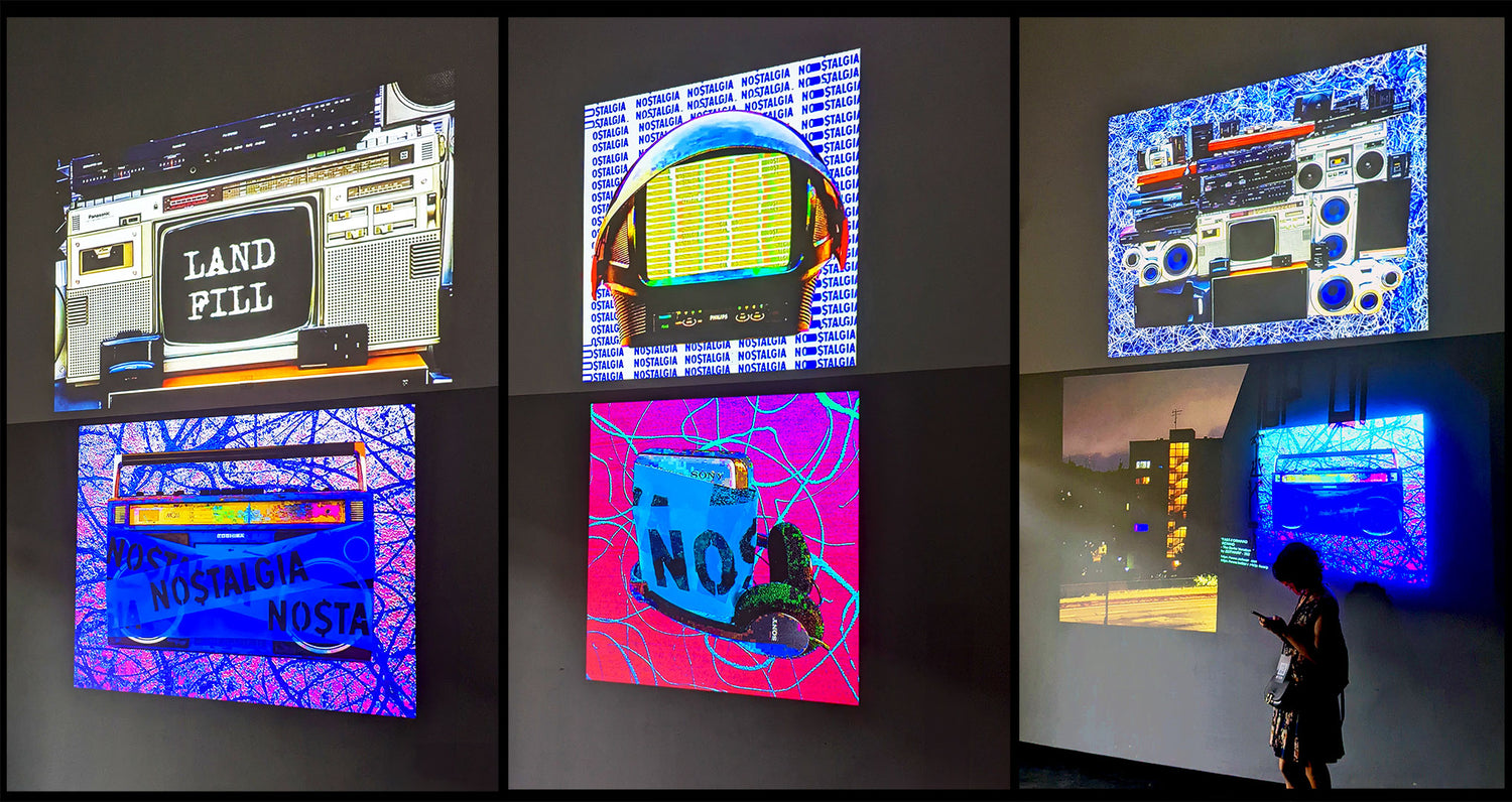 Digital Artwork Exhibition in a darkened gallery in Milan with a person in front