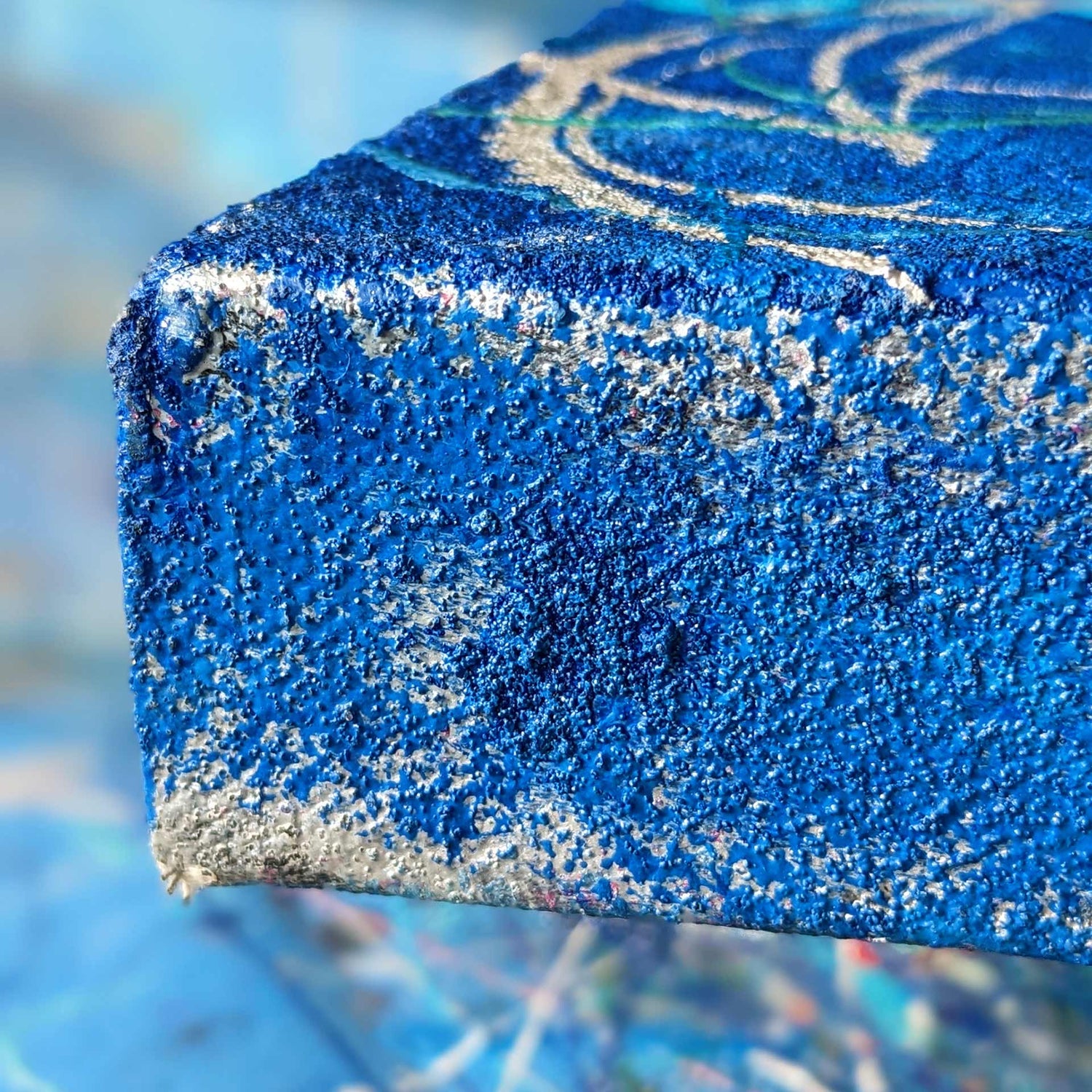 Close up detail of the blue and silver surface of the Music Art painting 'G Major V' by the artist Zeitwarp