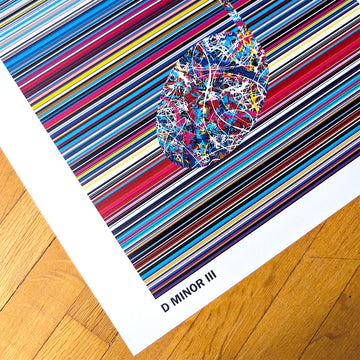 Close-up detail of the corner of a multicolour music art print