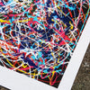 Close up detail photo of a multicoloured abstract giclée print