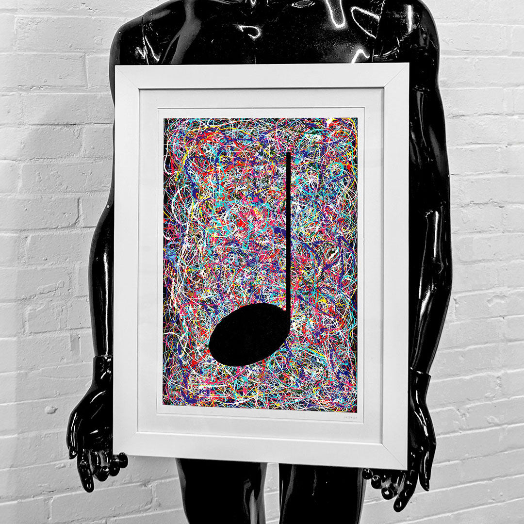 Framed multicoloured abstract music art giclée print held by a black mannequin with blue 