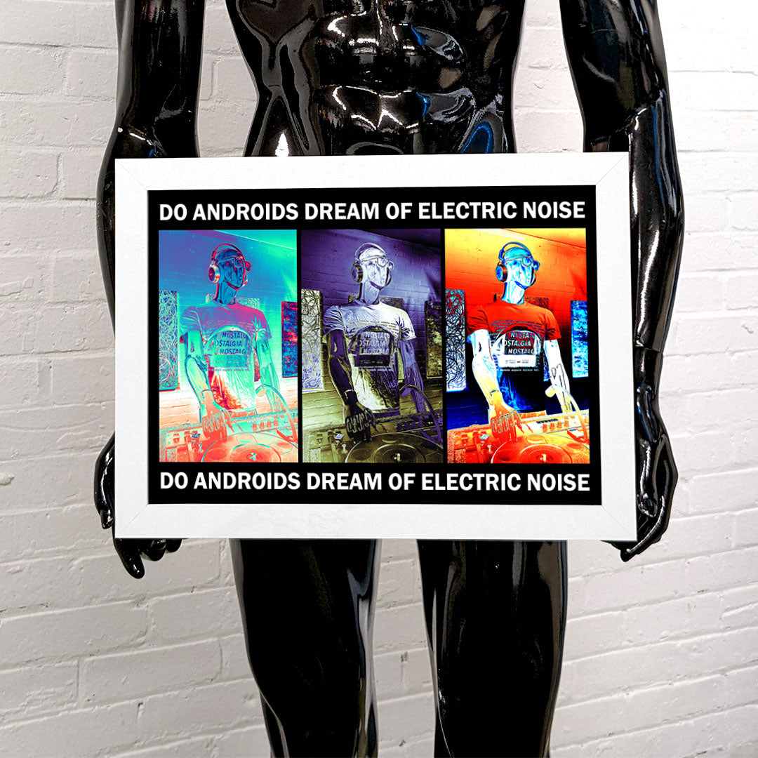 Black mannequin holding a framed art print of a DJ