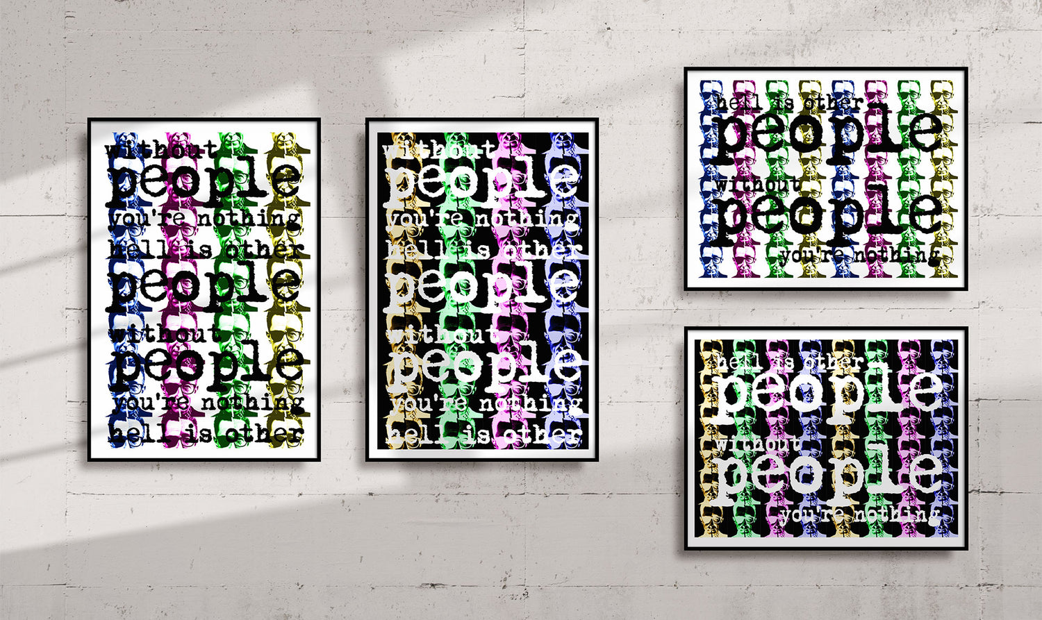 Collection of framed giclée prints hanging on a light concrete wall