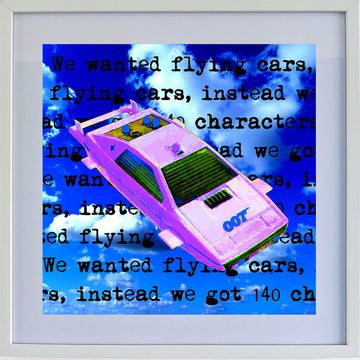 A toy james bond lotus car against a background of blue cloudy sky with typewritten words