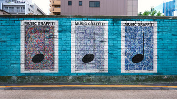 Street Art Mural with three Music Graffiti paintings on a turquoise wall in a city street