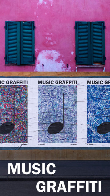 Music Graffiti glued posters on a wall in front of a dark pink house