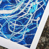 Close up detail photo of a blue and silver abstract giclée print of the music art painting 'G Major Five'​ by Zeitwarp