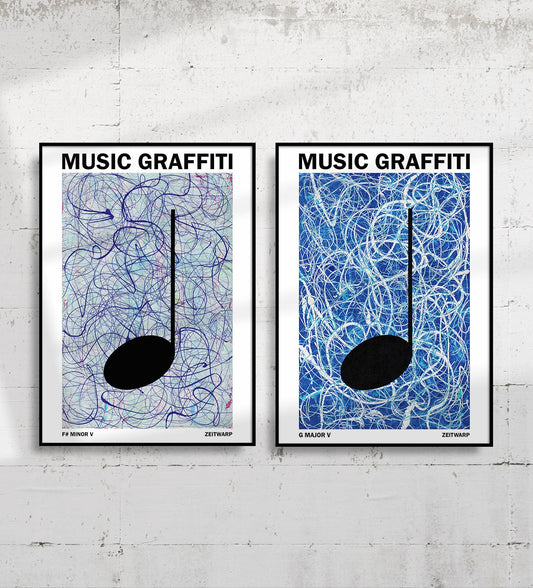 Pair of framed silver and blue MUSIC GRAFFITI art prints on a light grey industrial concrete wall