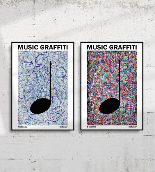 Pair of framed silver and multicoloured MUSIC GRAFFITI art prints on a light grey industrial concrete wall