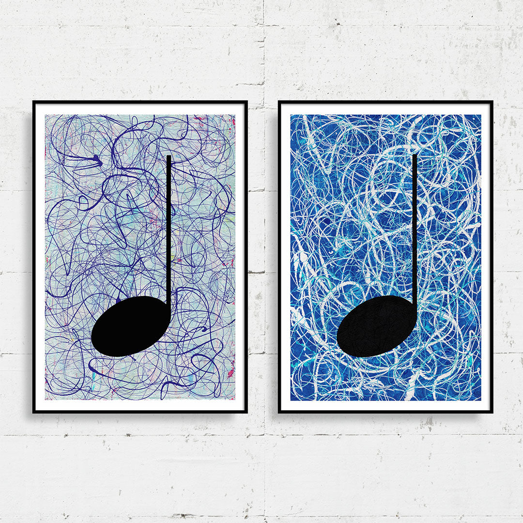 Pair of framed silver and blue Music themed Giclée Prints in an art gallery