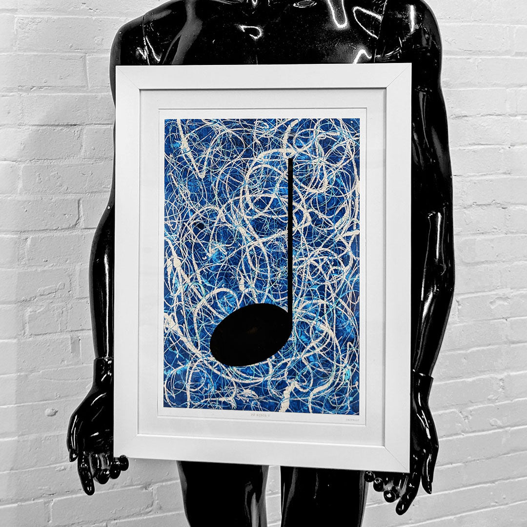 Blue framed music art giclée print held by a black mannequin