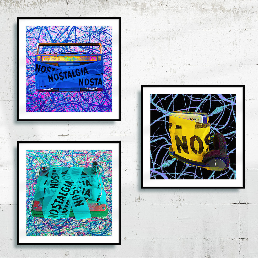 Three music art prints framed in black on a white gallery wall