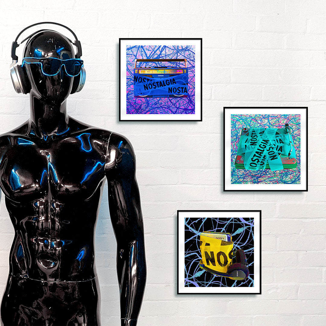 Black mannequin standing in an art gallery in front of three framed art prints