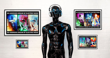 A futuristic black mannequin with sunglasses and headphones standing in front of four framed photos on a white wall