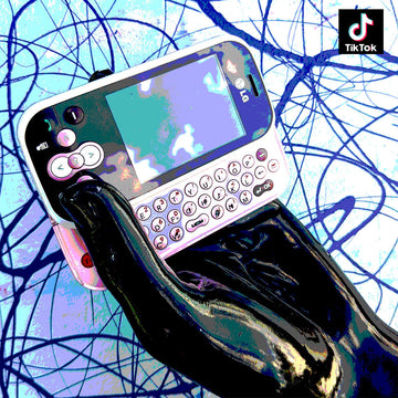 Black gloss hand holding a vintage LG mobile in front of an abstract background with the tiktok logo in the top corner