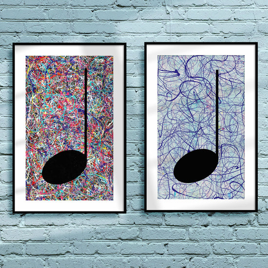 Pair of framed multicoloured Music themed Giclée Prints on a light blue brick wall